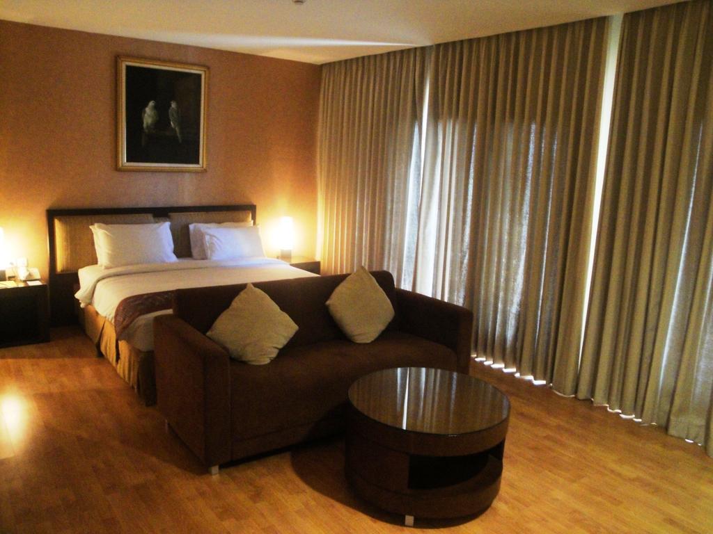 Sutanraja Hotel Manado Chambre photo